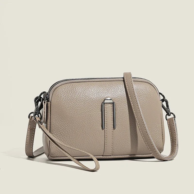 Genuine leather women's shoulder bag in horizontal square shape, shown in one of five colour options.