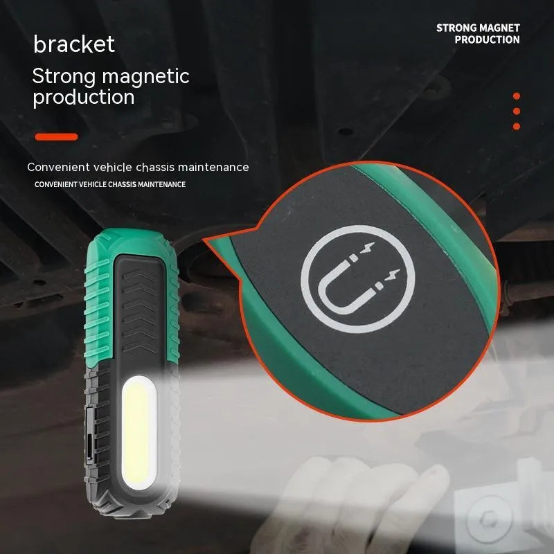 Black and green auto repair work light with USB charging cable