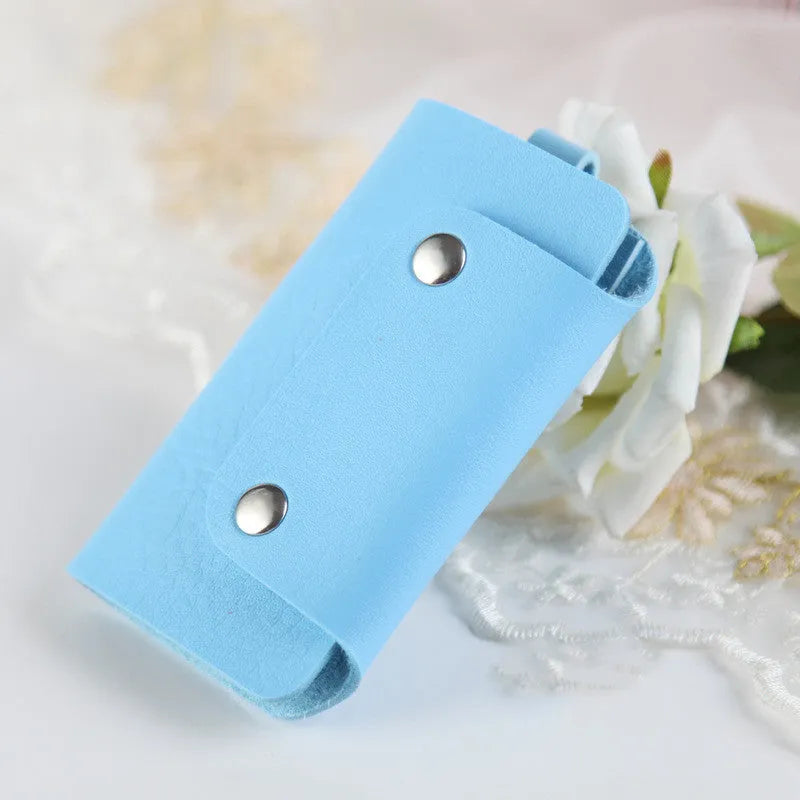 Soft PU leather colour button key case in square vertical section with key bit and cover opening in plain Korean style