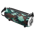F666 Mini portable Bluetooth speaker with fabric mesh finish, shoulder strap, and standing next to a mobile phone.