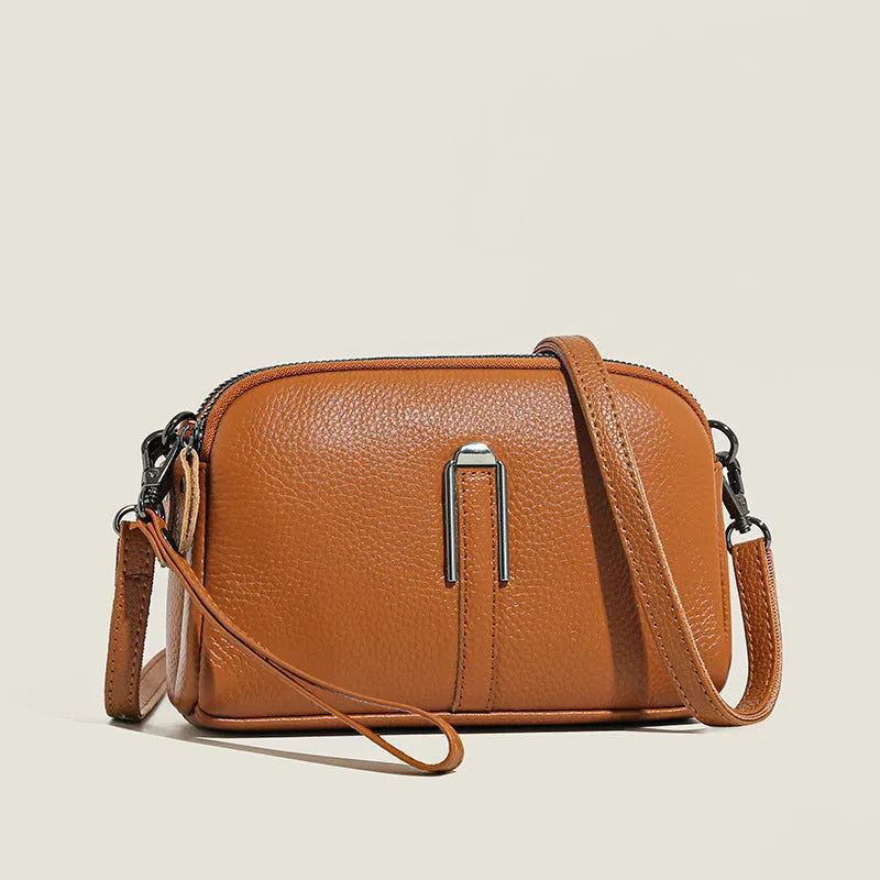 Genuine leather women's shoulder bag in horizontal square shape, shown in one of five colour options.