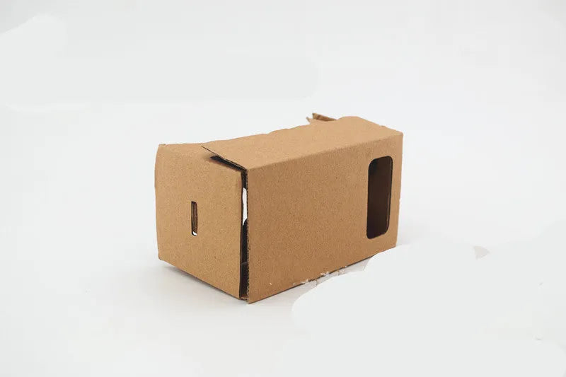 Pink cardboard VR glasses with 3D lenses and adjustable rubber band head strap for smartphones