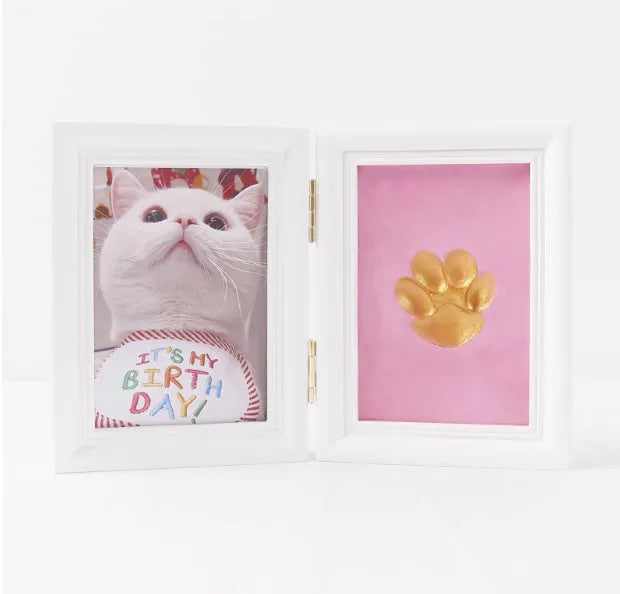 Solid wood cat palm print photo frame with gold lacquer and seal paste kit on table