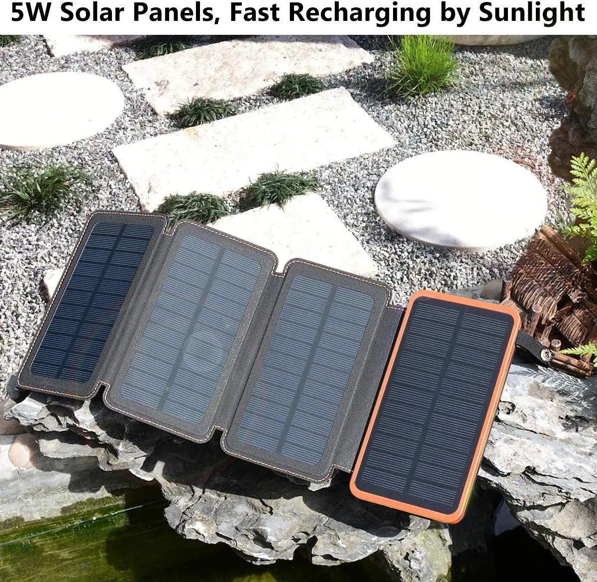 Black solar power bank with a solar panel, LED light, and soft leather exterior, shown outdoors.