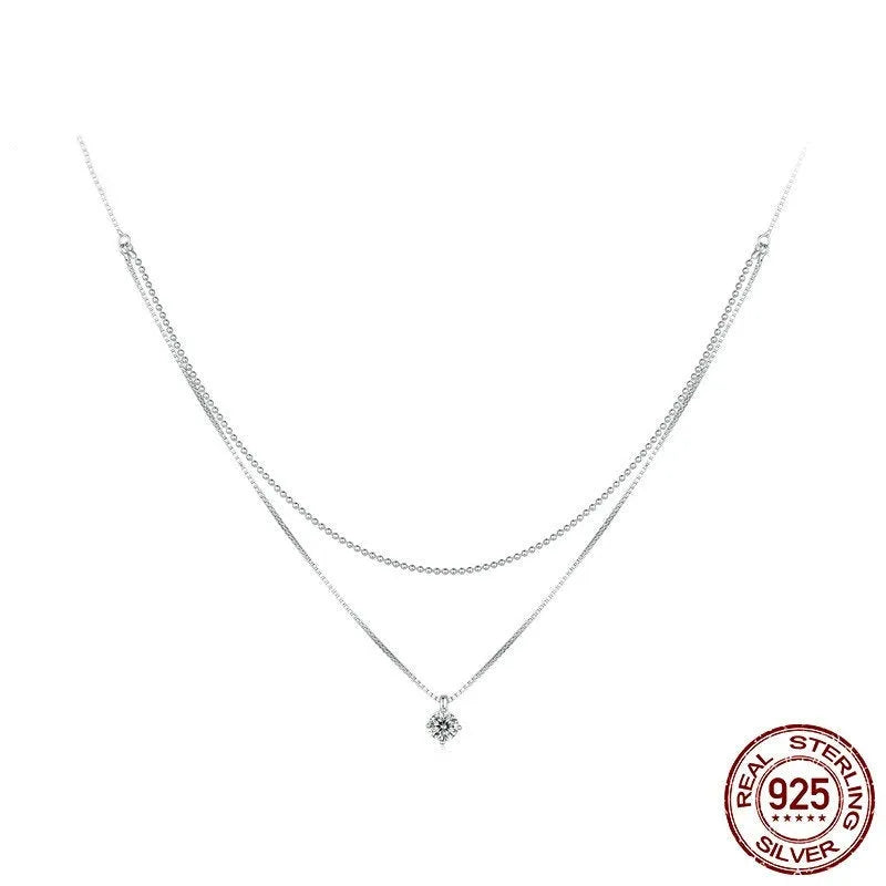 Women's sterling silver double-layer necklace with pearl chain and contemporary pendant