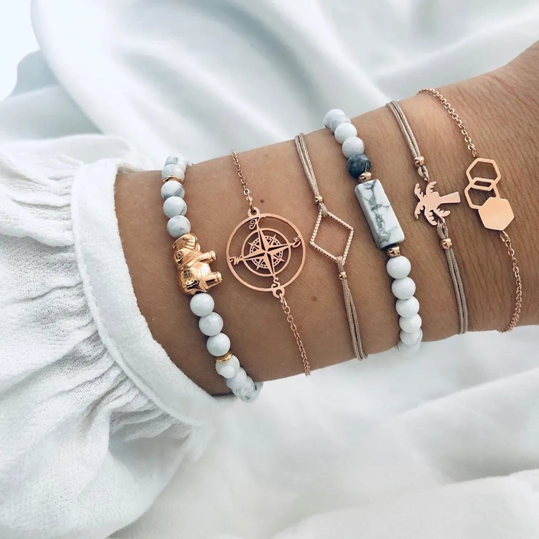 Bohemian bracelet set with alloy vintage bead and boho charm design in bow love style for women