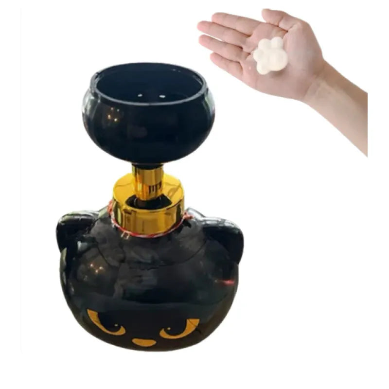 Black cartoon cat shaped plastic foam soap dispenser measuring 10x18cm