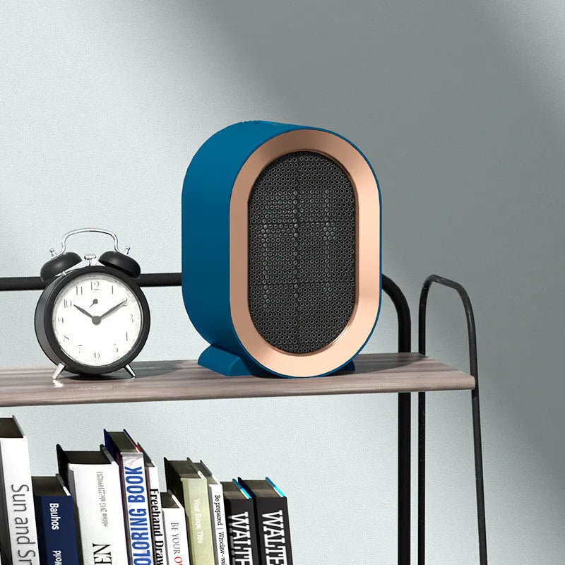 Desktop electric ceramic heater with mechanical controls and fan vent