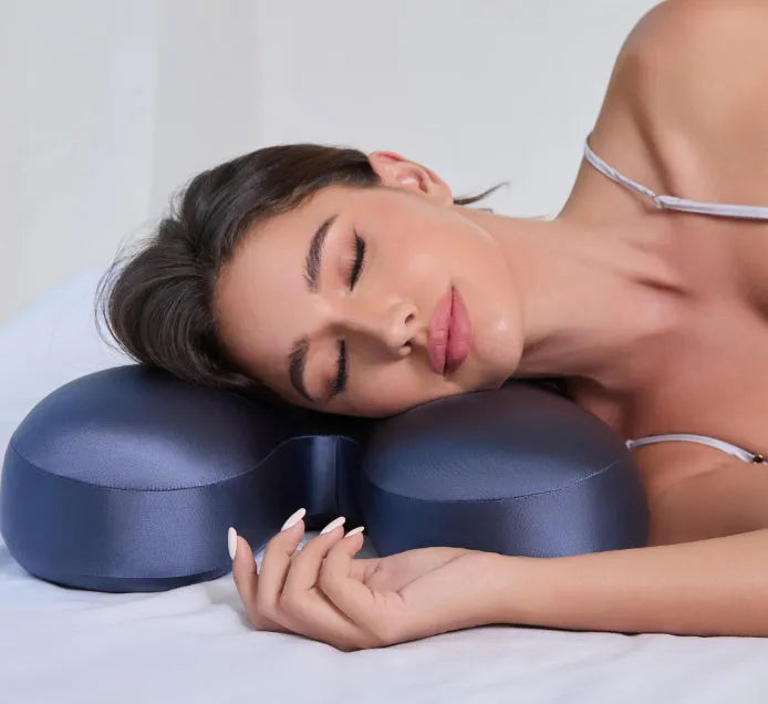 Purple memory foam side sleeping pillow 58x40cm on a bed
