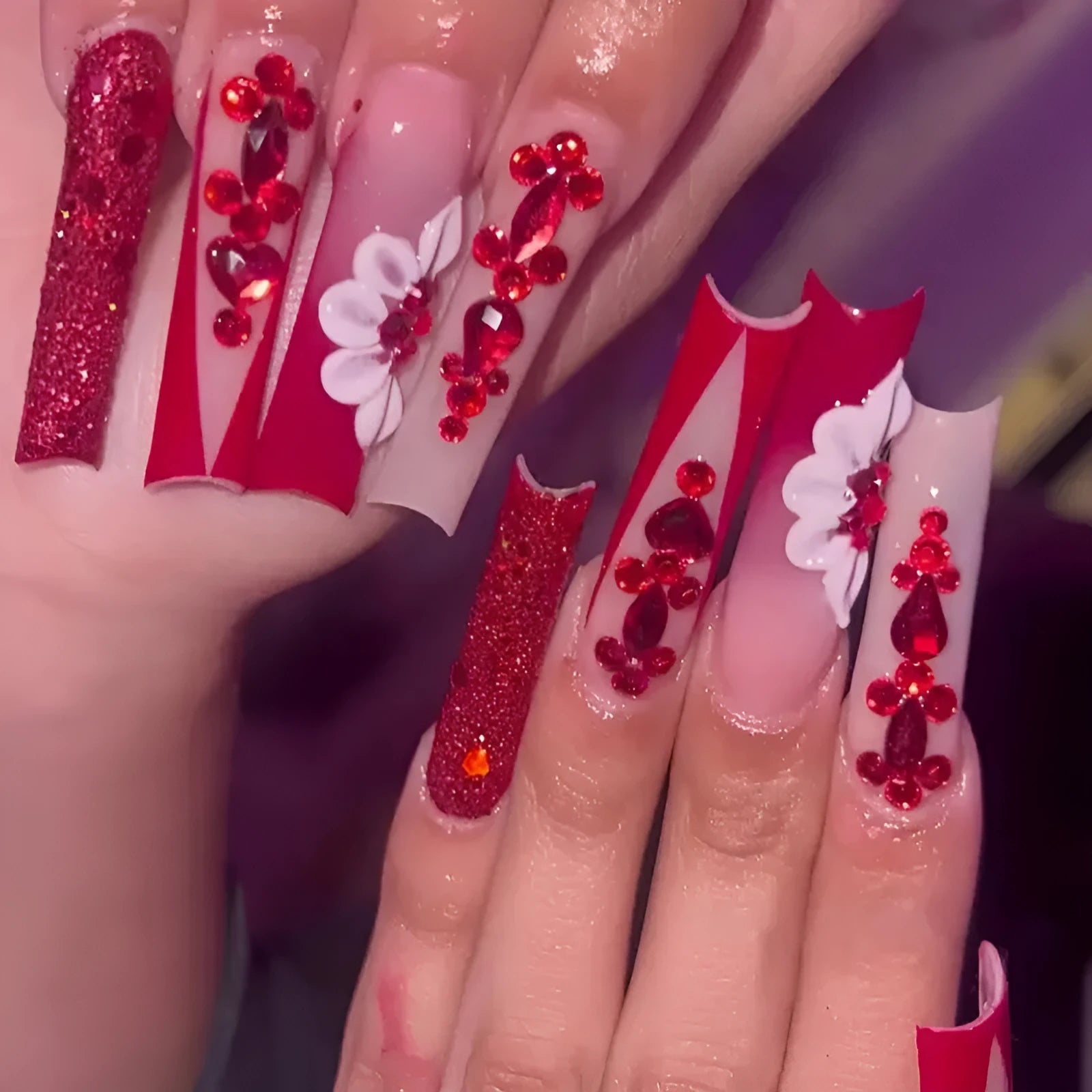 Floral press-on fake nails with prismatic red diamond accents in European square long shape