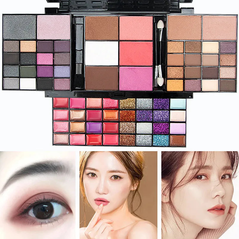 Open 74-colour makeup palette showing four layers of eyeshadow, lip gloss, blush, and contour powders with included brushes.