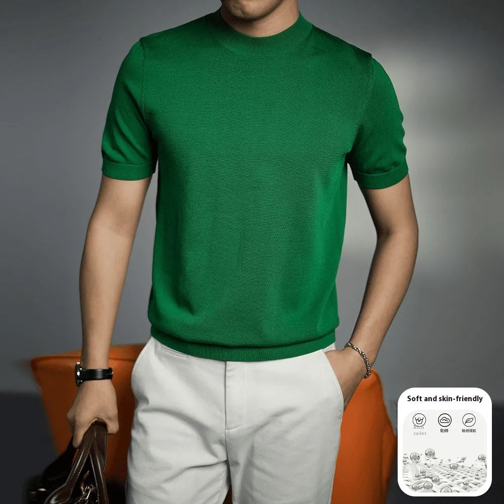 Man wearing a solid colour knitted business t-shirt with round neck and short sleeves.