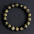 Natural obsidian crater ball bracelet with meteorite texture in silver or gold finish