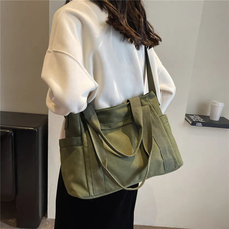 Large capacity polyester canvas shoulder tote bag in solid colour with phone compartment