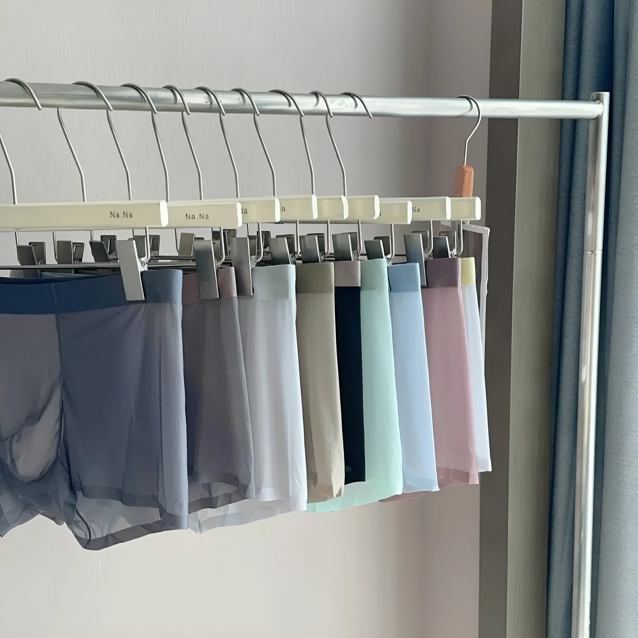 Seamless ultra-thin men's boxers in Ice Silk fabric with a honeycomb crotch, shown in a neutral colour.