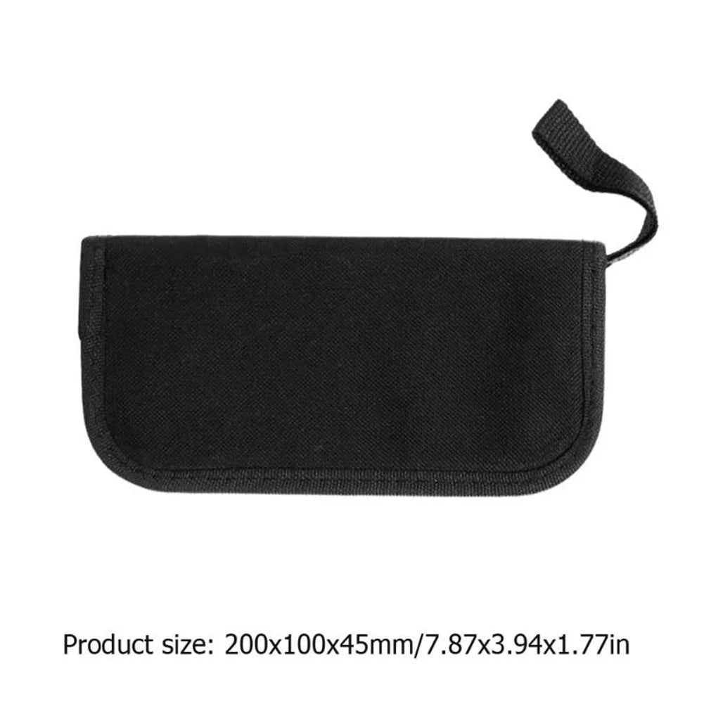 Black plastic and metal guitar repair kit for guitar, bass, mandolin, and banjo.
