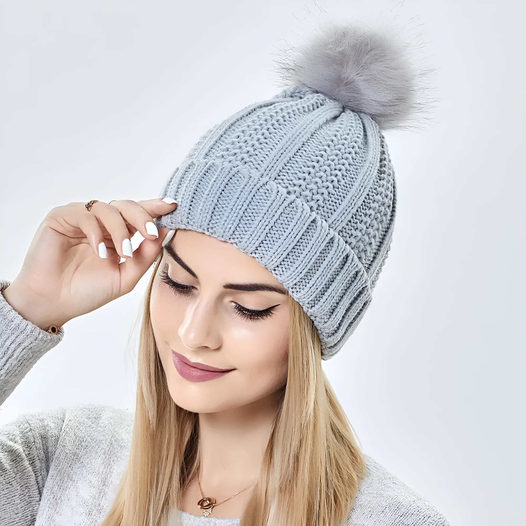 Wool beanie hat with satin lining and faux fur pom pom in wine red colour