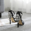 Black suede women's high heels with rhinestone details and fishmouth toe