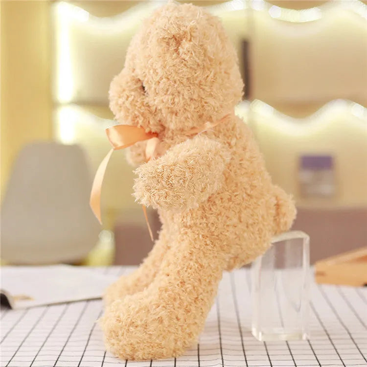 Yellow plush bear toy 30cm tall, made of soft fabric with PP cotton filling, standing upright on a plain background