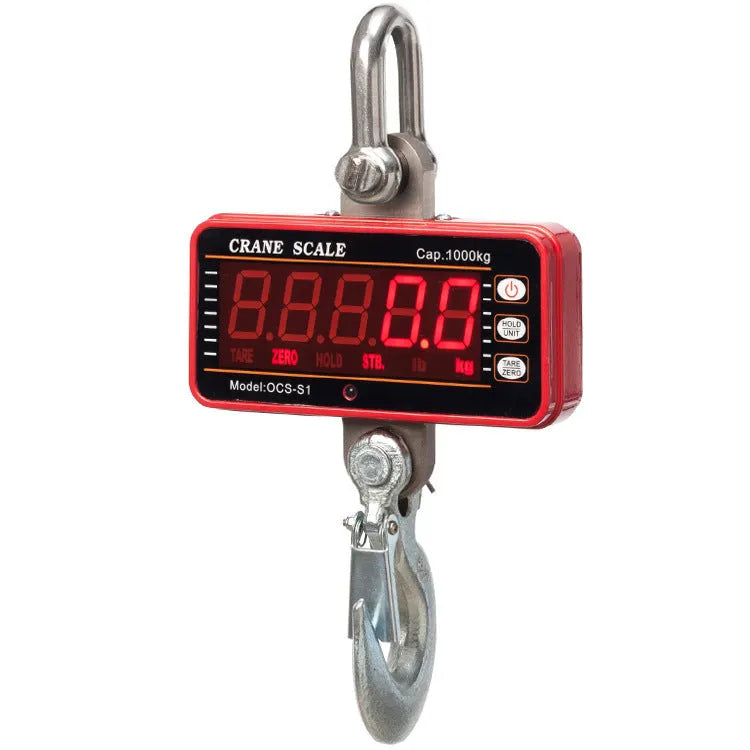 Orange electronic crane scale with digital display, shown with a 500 kg maximum load capacity rating.
