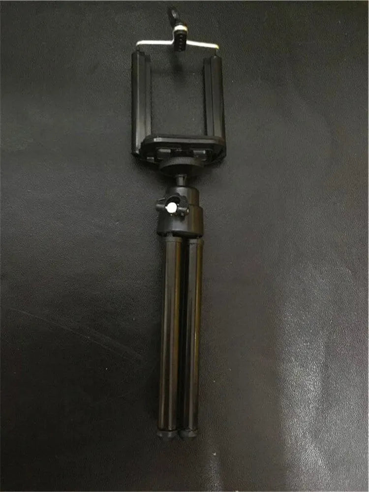 Two-section adjustable desktop phone holder in black and silver colour options on a desk