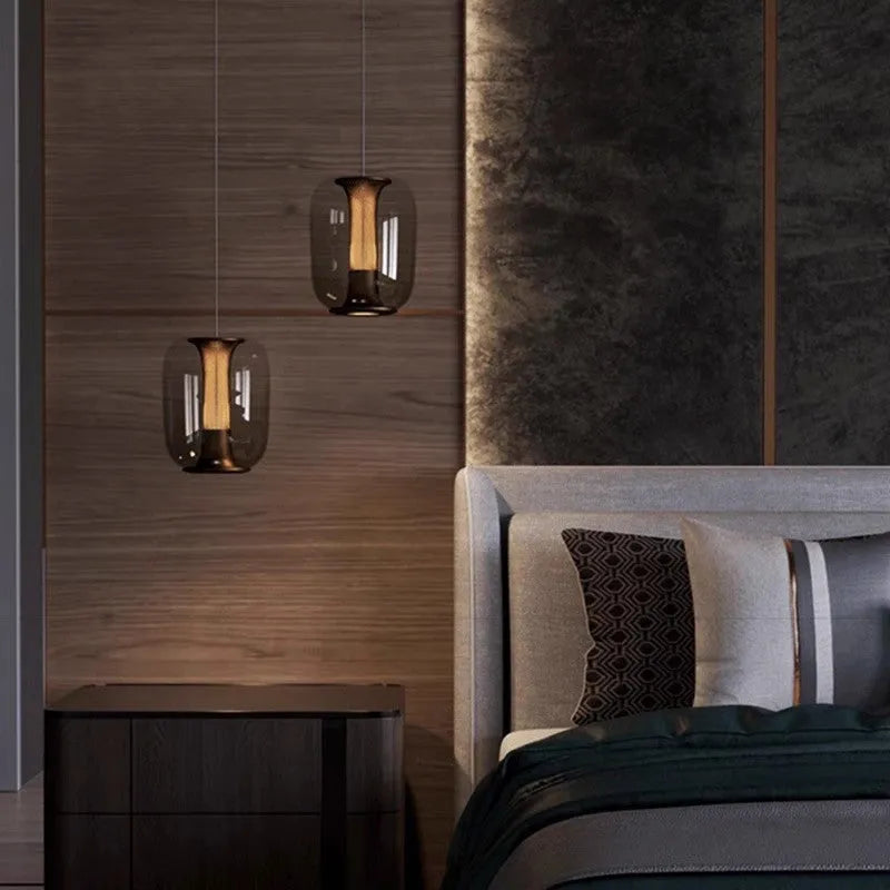 Minimalist Nordic single-light pendant chandelier with glass shade in smoke grey, cognac, or clear colour.