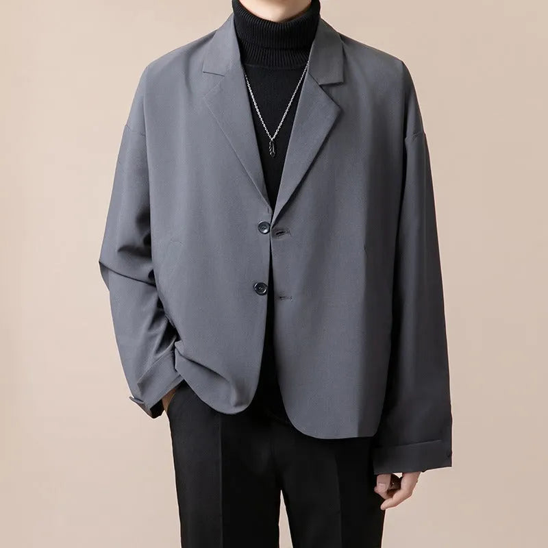 Casual loose fit suit jacket in chemical fibre blend fabric available in four colours