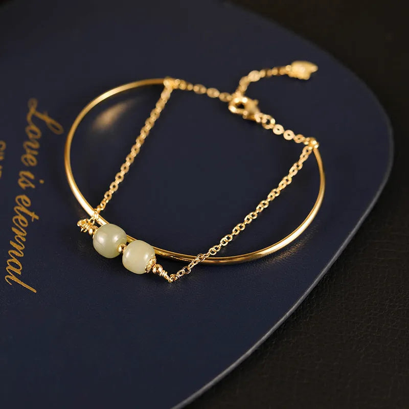 Women's jade lucky beads bracelet with gold inlay decoration in single, double and three beads versions