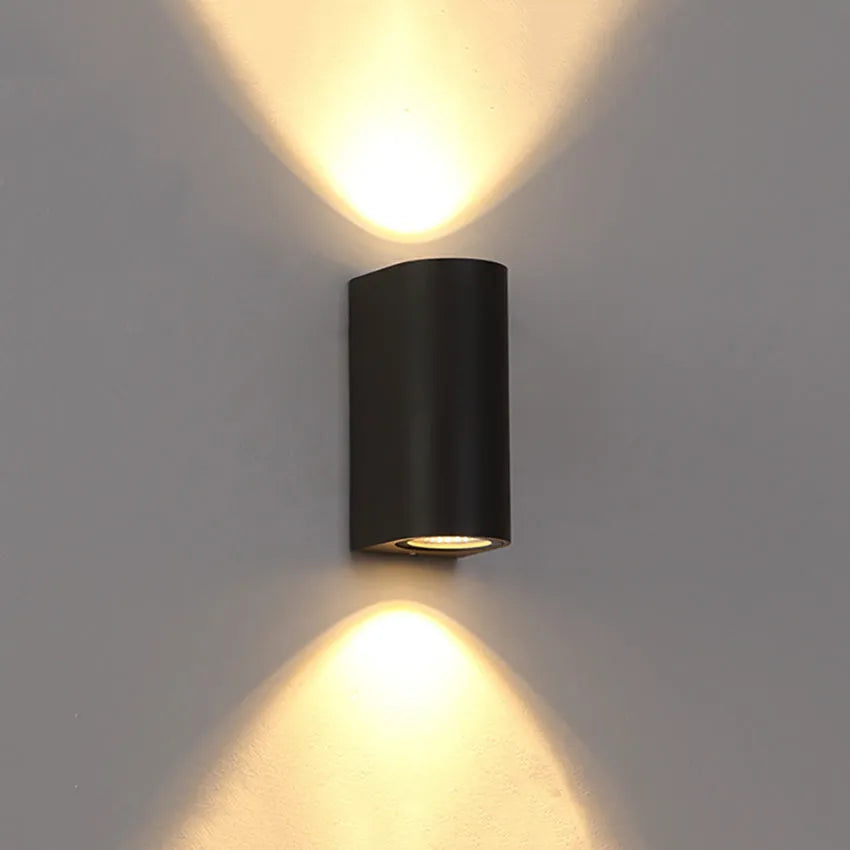 Black aluminium wall lamp with frosted glass shade and LED light source