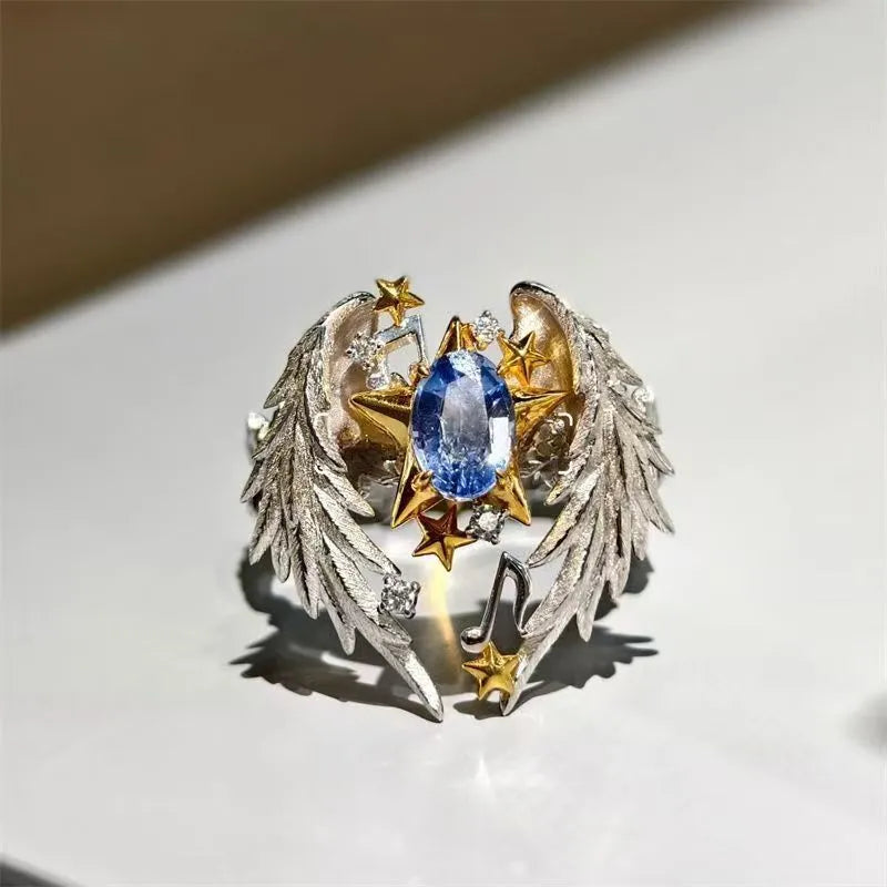 Geometric adjustable alloy ring with open mouth design showing metallic finish