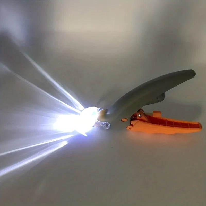 Yellow LED pet nail trimmer with magnifying glass and light-up head for trimming cat and dog nails.