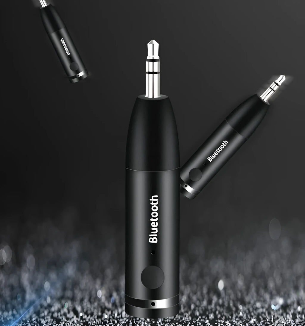 Black car Bluetooth audio receiver with USB cable for wireless music streaming to AUX stereo systems