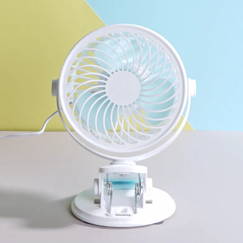 Compact USB desk fan with three blades and brushless motor for quiet operation below 36dB