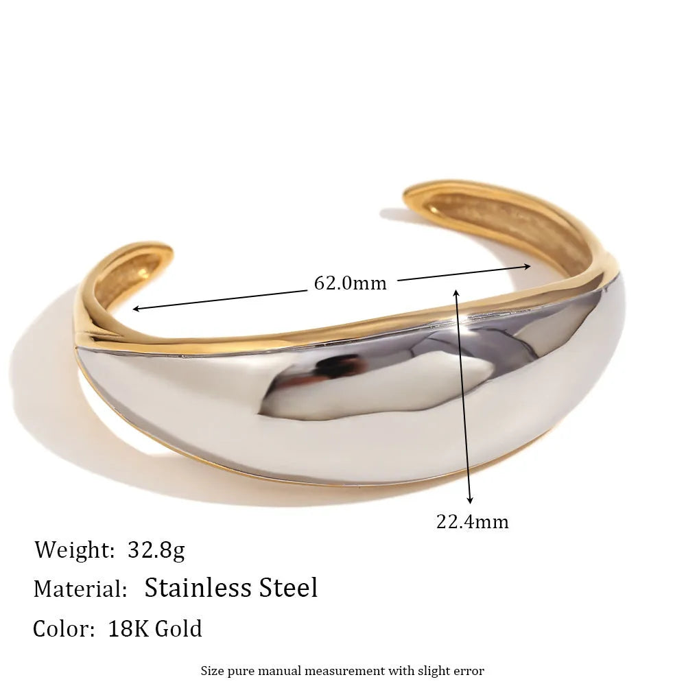 Gold electroplated geometric jewellery set with earrings, bracelet and necklace on white background