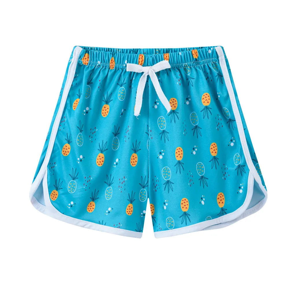 Children's casual polyester shorts in assorted colours and prints like pineapple, kitten, and stripes for beach wear.