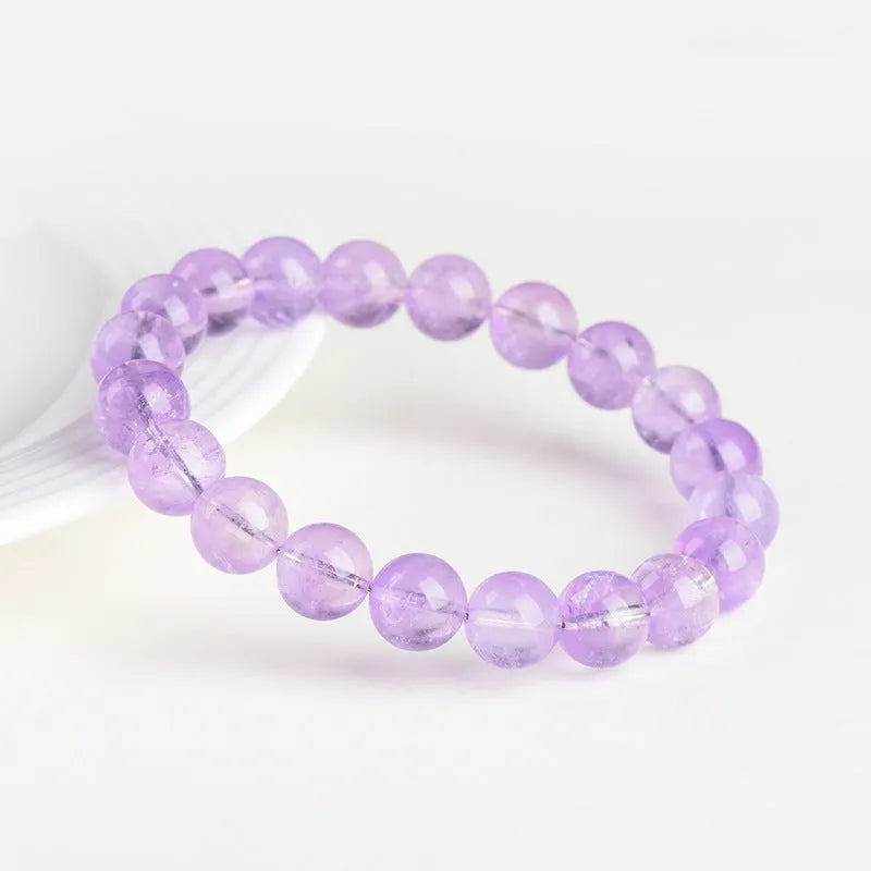 Lavender amethyst bracelet with water ripple design on round beads in two colour options.
