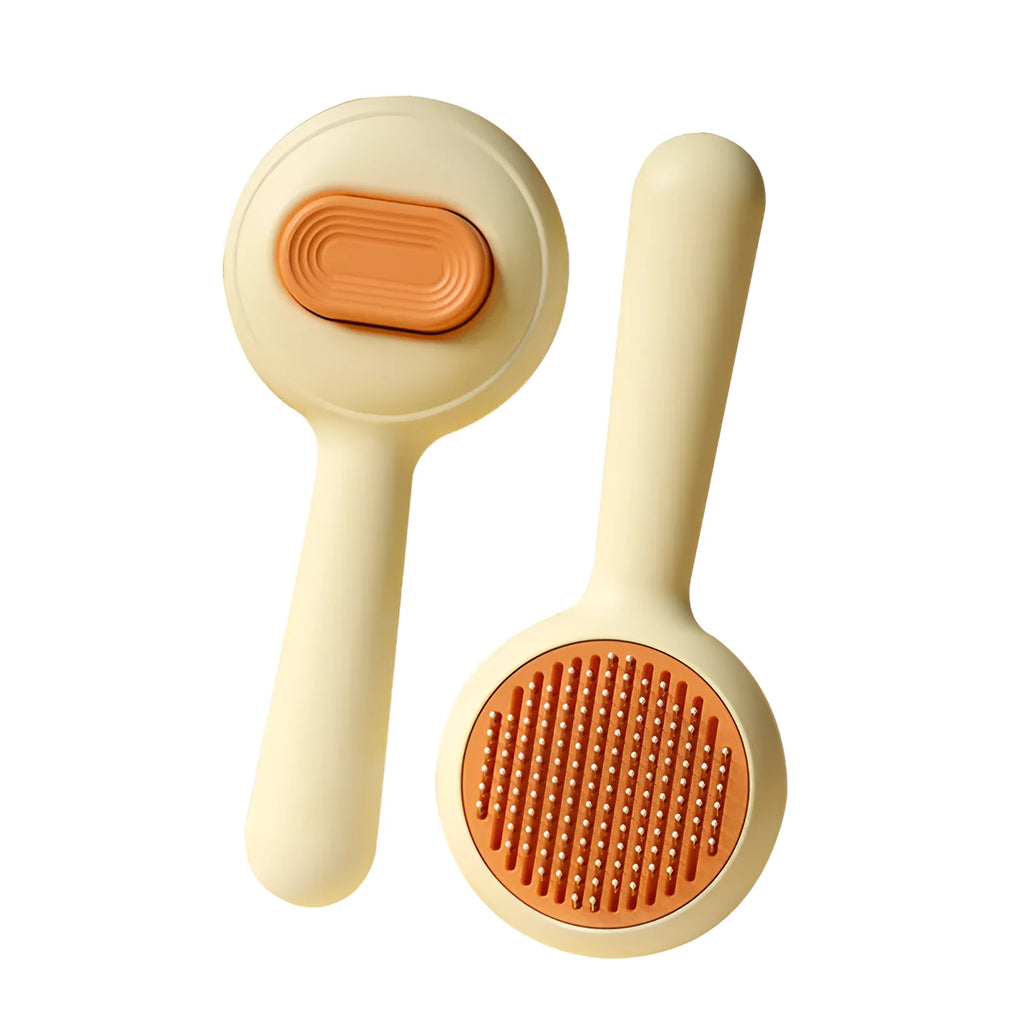 Green and yellow pet grooming brushes with stainless steel pins and rubber handles.