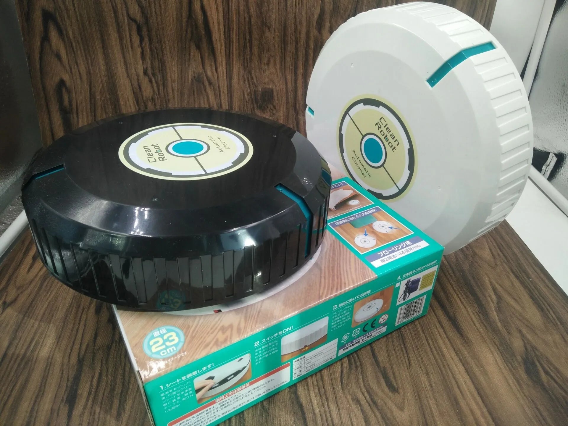 AC robot vacuum cleaner in black or white with automatic dirt detection for multiple floor types
