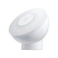 White modern bedside table lamp with Bluetooth and body induction sensor.