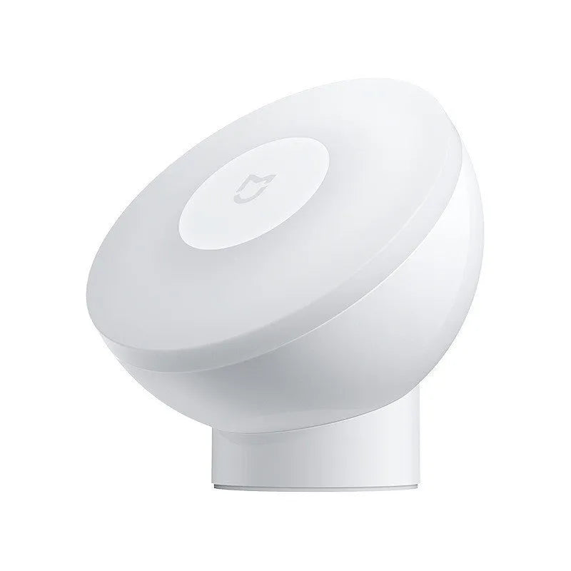 White modern bedside table lamp with Bluetooth and body induction sensor.