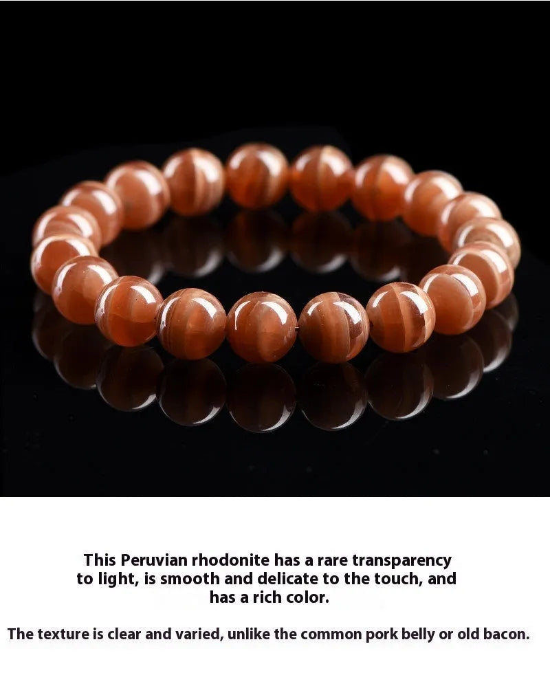 Natural Rhodochrosite round beads bracelet from Peru with geometric design and Ruyi elements