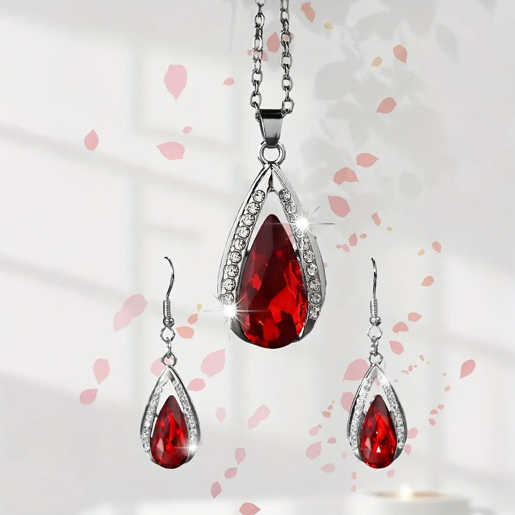 Black and red alloy water droplet pendant necklace and matching earrings jewellery suite.