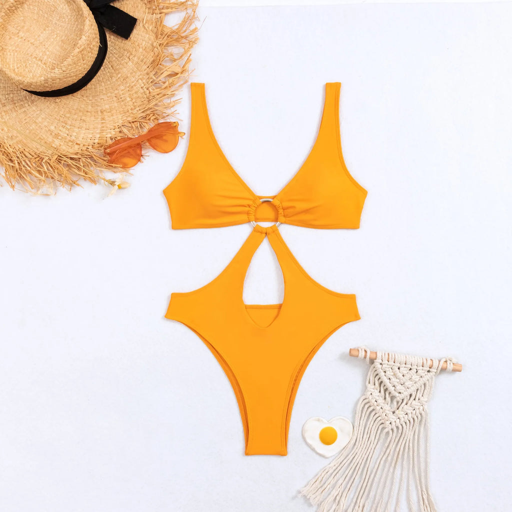 Women's black triangle one-piece swimsuit on a mannequin, sleeveless design.