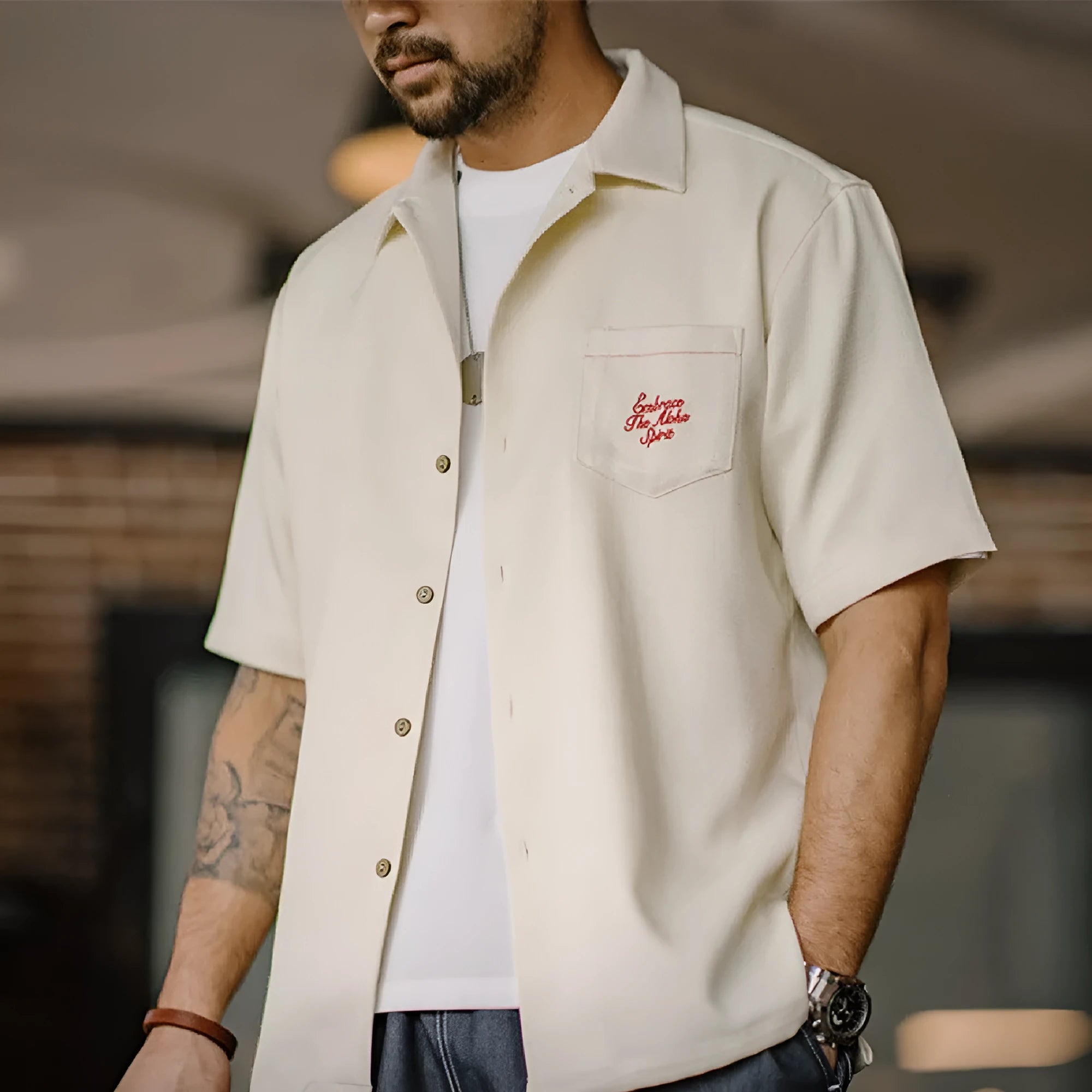 Light apricot men's Cuban collar shirt with bamboo plant pattern and short sleeves