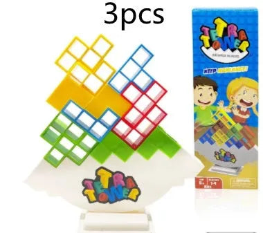 Balance stacking game with 16 plastic building blocks, chassis, and base on a table