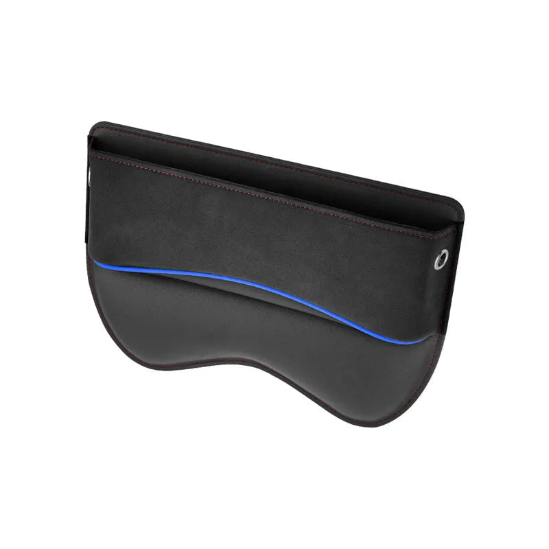 Black leather car seat storage box on a vehicle seat showing its rectangular shape and size.