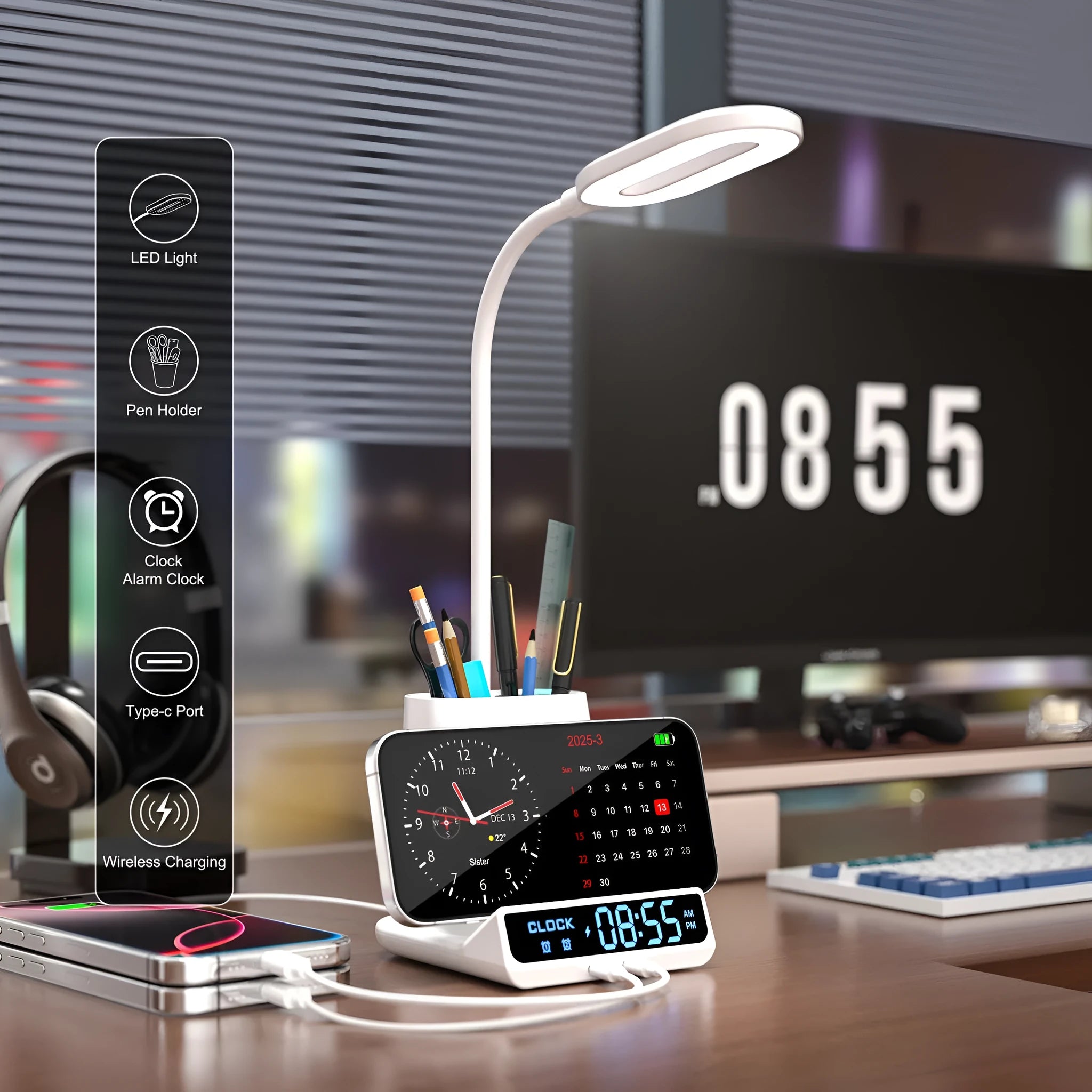 Modern black desk lamp with wireless charging pad, pen holder, and storage box on a desk.