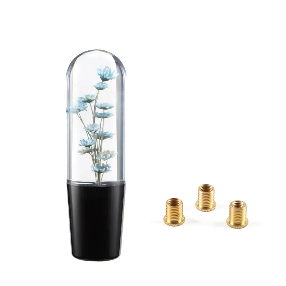 JDM crystal car gear knob with flower-in-water design, 15cm long, shown with three fitting adapters