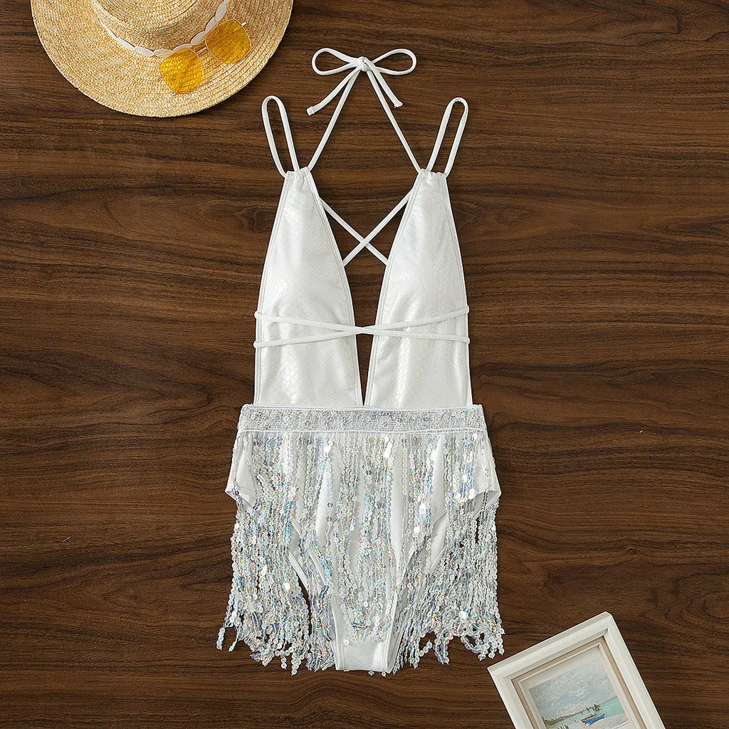 White deep V-neck one-piece swimsuit with tassel detailing, briefs style cut for swimming
