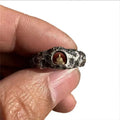 Hand-forged copper grotto Buddha ring with rock texture finish shown in size 8